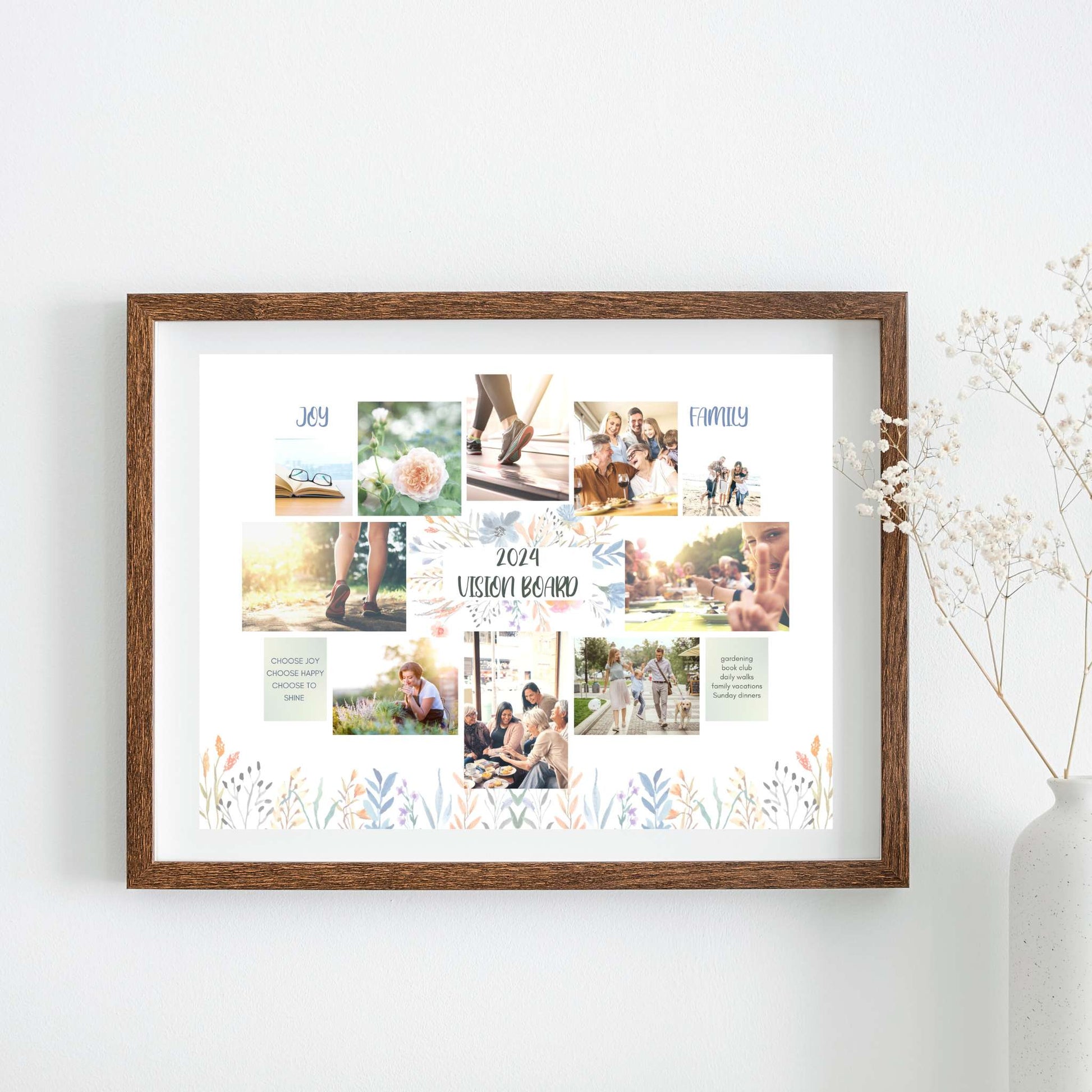 Floral vision board design in frame hanging on wall